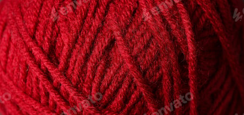 Preview: Red ball of yarn all over background, closeup