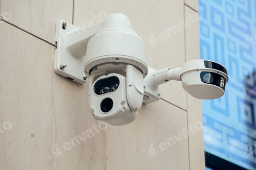 Preview: Several Modern CCTV cameras on wall. Concept of enhanced control surveillance and monitoring.