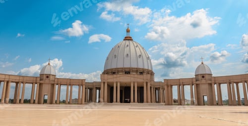 Preview: Basilica of Our Lady of Peace in Yamoussoukro Ivory Coast under a clear blue sky