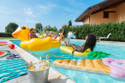 Preview: Friends having fun in a swimming pool