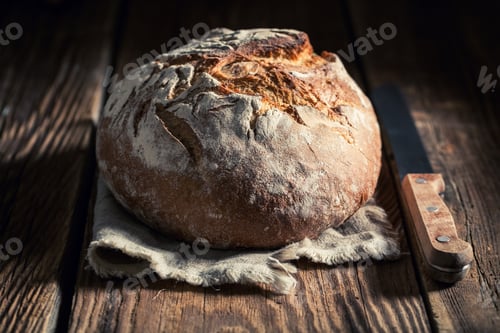 Preview: Healthy loaf of bread in rustic kitchen
