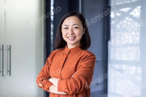 Preview: Portrait of young beautiful and successful Asian business woman, female employee smiling and