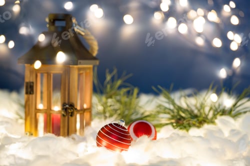 Preview: Magical Lantern On Snow With Christmas Decoration and holiday lights.