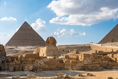Preview: Majestic Giza Necropolis Pyramids and Sphinx Under a Sky of Clouds, Enduring Historical Landmark