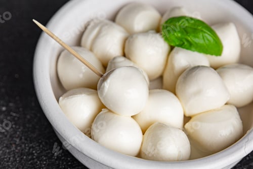 Preview: Mozzarella mini cheese balls dish fresh delicious gourmet food background