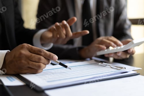 Preview: Businessmen meeting to discuss financial advisors audit accounting and analyzing financial figures.