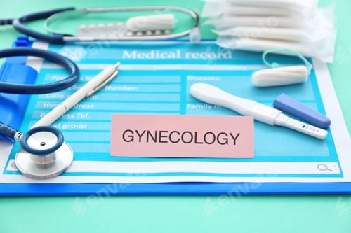 Preview: Composition with clipboard, pregnancy test and stethoscope, closeup. Gynecological care