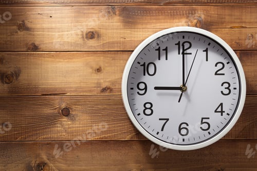 Preview: wall clock at wooden background