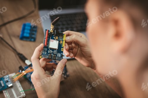 Preview: Engineer Working On Circuit Board