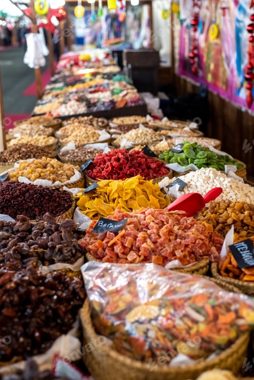 Preview: Raisins, dates and other candied fruits, sugar coated, for sale in a market.