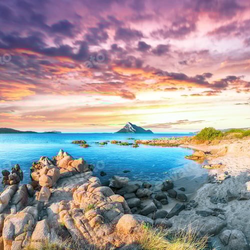 Preview: Superb evening scene of Porto Taverna beach with Tavolara mountain on background.