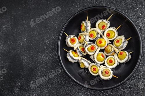 Preview: olive stuffed anchovy fillet, anchovys roll stuffed olives apetizing seafood fish