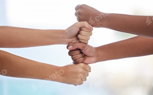 Preview: Closeup shot of two unrecognisable women stacking their fists together