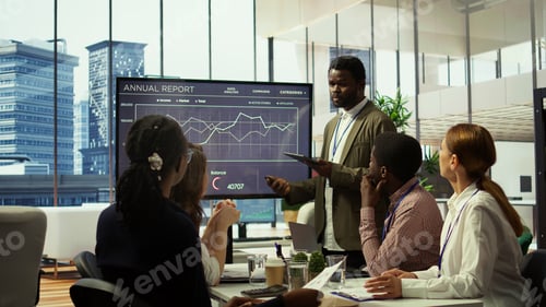 Preview: CEO and management team gathering in boardroom for a project briefing