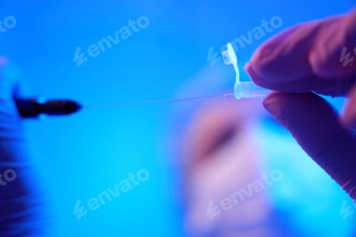 Preview: Lab scientist transferring biological material to cryotube