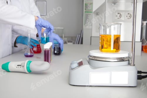 Preview: A doctor conducting research with plastic medical tubes in a modern laboratory.