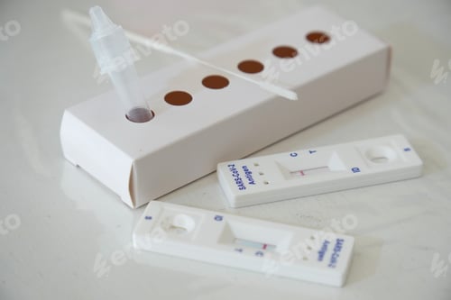 Preview: Closeup of antigen covid-19 home tests on a white table