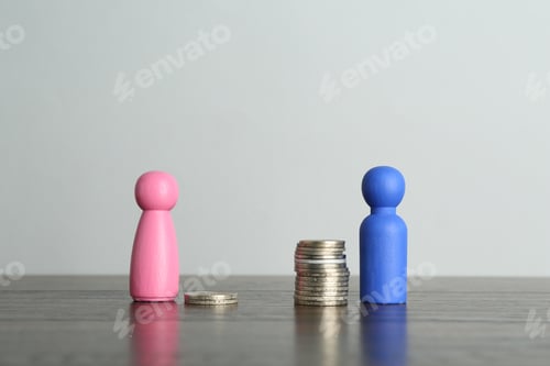 Preview: Financial inequality. Male and female figures with uneven amount of coins on wooden table