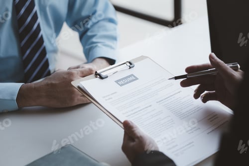 Preview: A person attends a job interview with a manager to join a company, he holds a resume and interview w