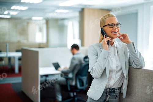 Preview: Portrait of successful business manager talking on smart phone.