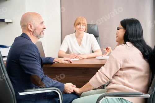 Preview: Husband and wife visiting reproductologist at private medical clinic