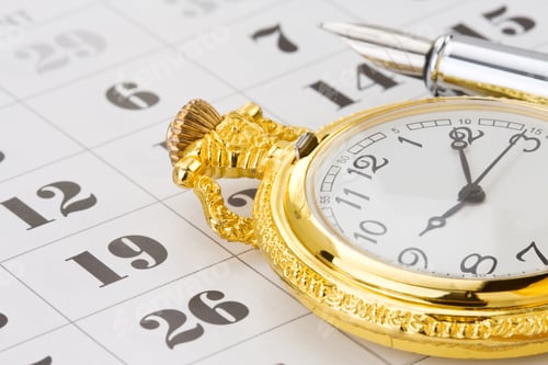 Preview: ink pen and watch on calendar
