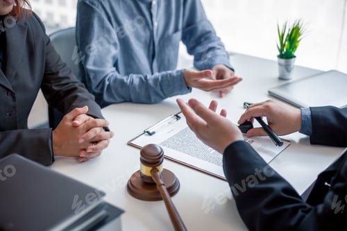 Preview: Businessman and lawyer discuss the contract document. Treaty of the law. Sign a contract business.