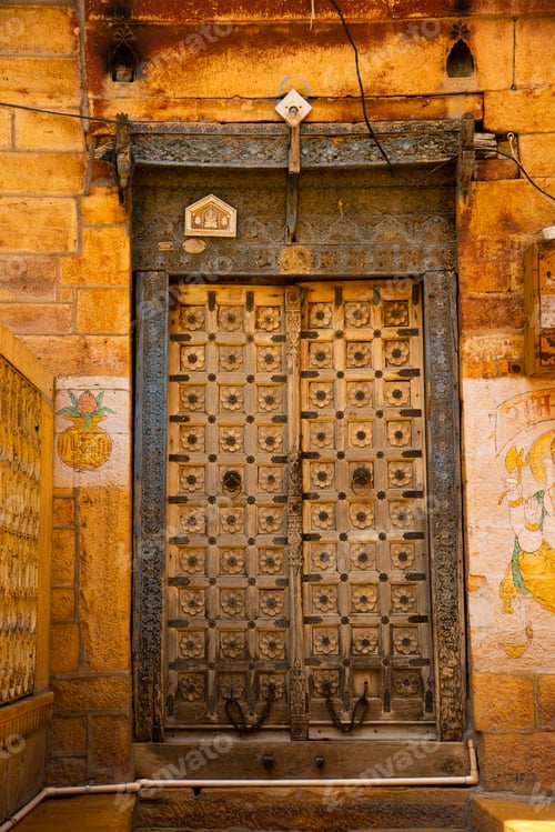 Preview: Old wooden doors of street houses in old town, Jaisalmer, India.