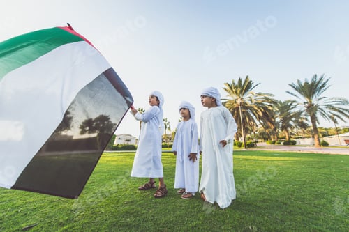 Preview: children playing together in Dubai in the park.