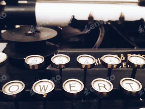 Preview: Vintage typewriter buttons on qwerty text