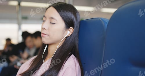 Preview: Woman sleeping on ferry and listen to music