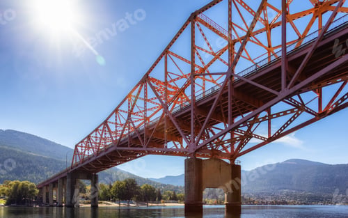 Preview: Big Orange Bridge over Kootenay River with Touristic Town in background