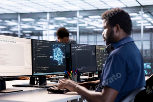 Preview: Computer scientist in server room workspace using artificial intelligence