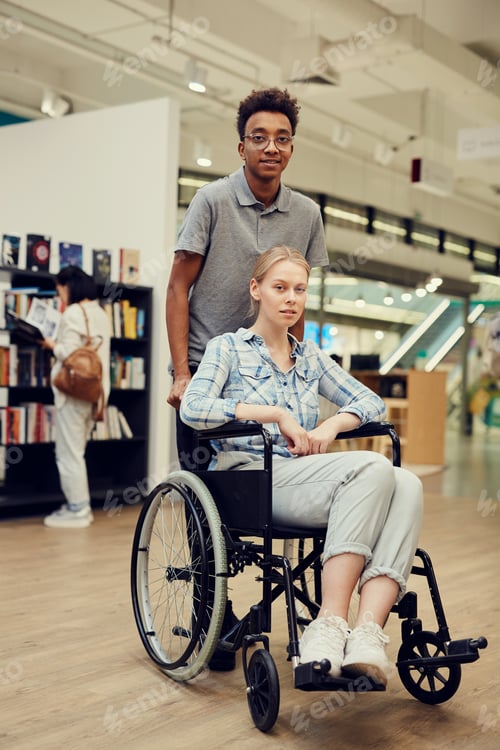 Preview: Black student pushing wheelchair with girl