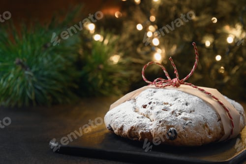 Preview: Christmas stollen - traditional German bread on brown.