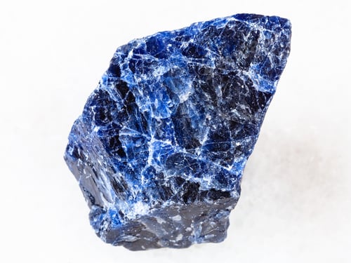 Preview: rough Sodalite gemstone on white