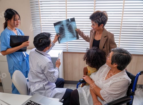 Preview: At hospital room patient sit on wheel chair looking x-ray film relative discuss with doctor
