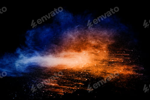 Preview: Orange blue powder explosion on black background.Orange blue color dust splashing.