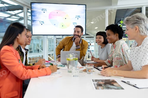 Preview: Front view of diverse business people discussing in the meeting at conference room in office