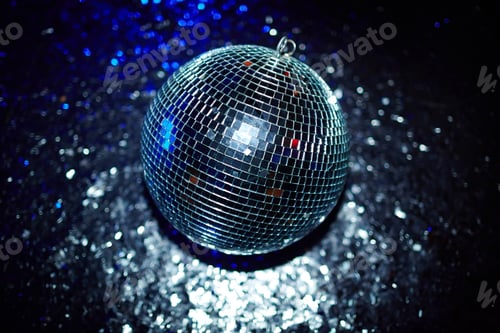 Shiny Disco Ball Under Blue Lights