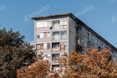Preview: Low angle shot of an antique apartment building