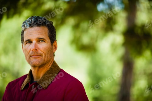 Preview: Head and shoulders of a mature man in the open air.