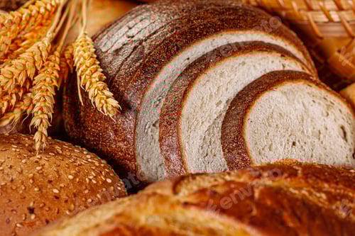 Preview: Fresh baked bread. Assorted bakery products loafs of bread and rolls...