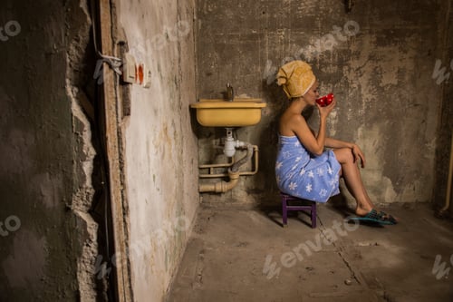 Preview: Cheap Accommodation. Girl Drinking Tea In An Old Apartment
