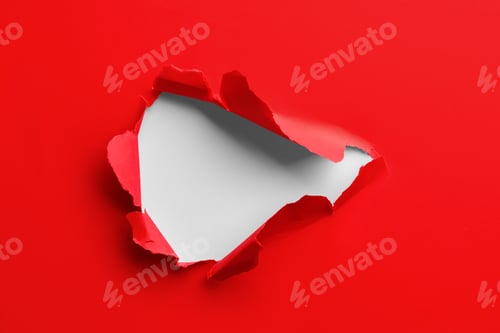 Preview: Hole in red paper on white background