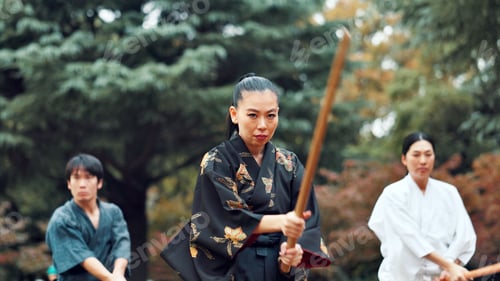 Preview: Martial arts, park and instructor with wood sword for fight, battle and samurai training class. Woo