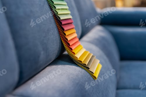 Preview: Tissue catalog. Catalog of multi-colored fabric samples.