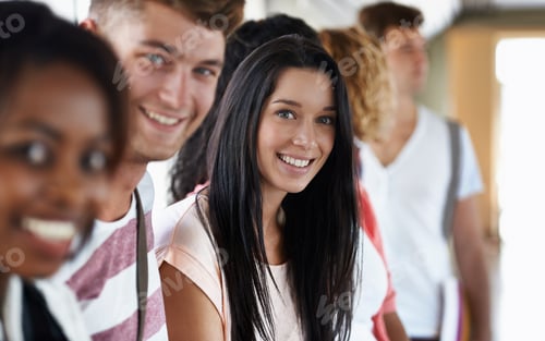 Preview: She loves university life. Portrait of a beautiful young college student standing with her friends.