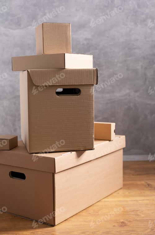 Preview: Stack of cardboard box on floor. Cardboard boxes for moving to new home. Relocation concept