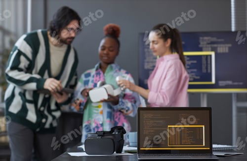 Preview: Team of programmers testing VR glasses